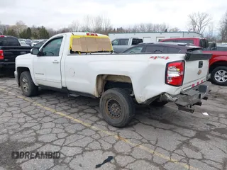 2015 Chevrolet Silverado 1500 LT with VIN 1GCNKRECXFZ414527, listed as a IAAI auction lot 41024683 with 219,673 mi miles. Bid and sale history available at carsss.com. Image 3.