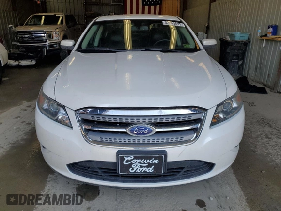 2012 Ford Taurus SEL z VIN 1FAHP2HW8CG133657, wystawiony jako Copart lot #52865895 z przebiegiem 132 876 mil mil oraz Szkoda całkowita • Salvage title. Historia ofert i sprzedaży dostępna na DreamBid. Obrazek 5.