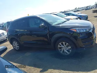 2021 Hyundai Tucson Value with VIN KM8J33A45MU391039, listed as a IAAI auction lot 42086825 with 16,910 mi miles. Bid and sale history available at carsss.com. Image 13.