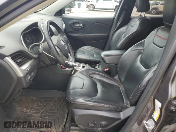 2014 Jeep Cherokee Trailhawk z VIN 1C4PJMBS9EW159721, wystawiony jako Copart lot #60719525 z przebiegiem 136 807 mil mil oraz Szkoda całkowita • Salvage title. Historia ofert i sprzedaży dostępna na DreamBid. Obrazek 7.