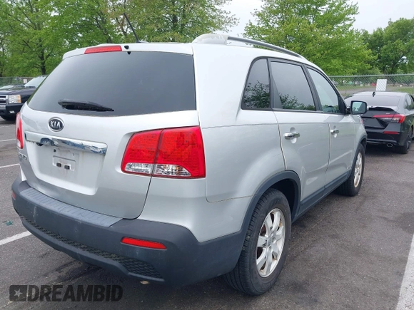 2012 Kia Sorento LX with VIN 5XYKTDA60CG296159, listed as a IAAI auction lot 42197638 with 198,676 mi miles. Bid and sale history available at carsss.com. Image 4.