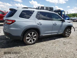 2023 Honda Pilot Touring with VIN 5FNYG2H78PB006054, listed as a Copart auction lot 56039785 with 35,831 mi miles and Salvage title. Bid and sale history available at DreamBid. Image 3.