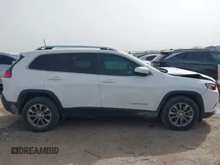 2019 Jeep Cherokee Latitude Plus with VIN 1C4PJLLB0KD307741, listed as a IAAI auction lot 41750370 with 76,036 mi miles. Bid and sale history available at carsss.com. Image 13.