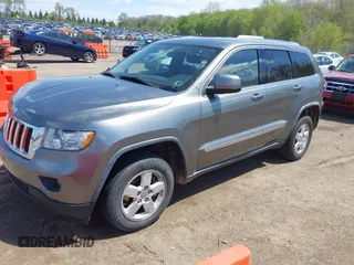 2011 Jeep Grand Cherokee Laredo with VIN 1J4RR4GGXBC587911, listed as a IAAI auction lot 42156885 with 178,999 mi miles and . Bid and sale history available at DreamBid. Image 17.