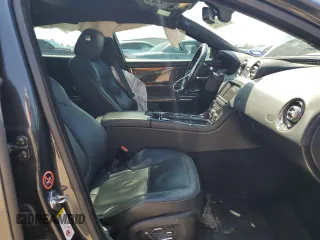 2013 Jaguar XJ with VIN SAJWA3HE9DMV49768, listed as a Copart auction lot 50339955 with 56,841 mi miles and Salvage Title. Bid and sale history available at DreamBid. Image 7.