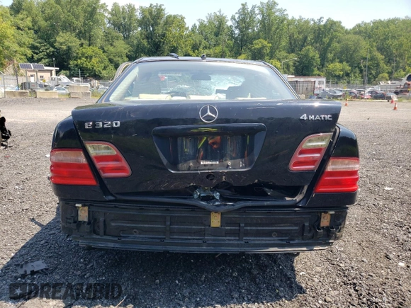 2002 Mercedes-Benz E-Class with VIN WDBJF82J62X067198, listed as a Copart auction lot 66073494 with 0 mi miles and Salvage Title. Bid and sale history available at carsss.com. Image 6.
