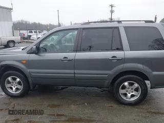 2007 Honda Pilot EX-L with VIN 5FNYF18677B033086, listed as a IAAI auction lot 41579680 with 280,246 mi miles and . Bid and sale history available at DreamBid. Image 14.