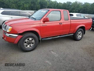 1999 Nissan Frontier XE with VIN 1N6ED26Y7XC305312, listed as a Copart auction lot 59299265 with 118,166 mi miles and Salvage title. Bid and sale history available at DreamBid. Image 1.
