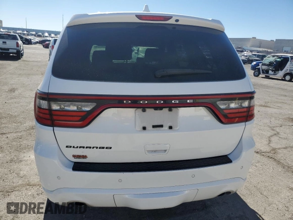 2014 Dodge Durango SXT with VIN 1C4RDHAG0EC972094, listed as a Copart auction lot 77396084 with 189,425 mi miles and Salvage Title. Bid and sale history available at DreamBid. Image 6.
