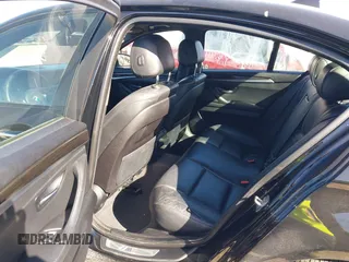 2016 BMW 5 Series 528i xDrive with VIN WBA5A7C56GG145318, listed as a IAAI auction lot 41414556 with 122,879 mi miles. Bid and sale history available at carsss.com. Image 8.