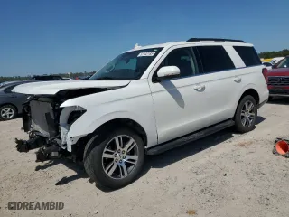 2024 Ford Expedition XLT with VIN 1FMJU1J84REA06771, listed as a Copart auction lot 52702185 with 20,995 mi miles and Salvage Title. Bid and sale history available at carsss.com. Image 1.