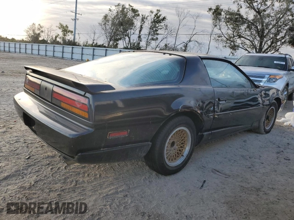 1992 Pontiac Firebird z VIN 1G2FS23T0NL203325, wystawiony jako Copart lot #76359414 z przebiegiem 198 651 mil mil oraz Nie do naprawy • Non repairable. Historia ofert i sprzedaży dostępna na DreamBid. Obrazek 3.