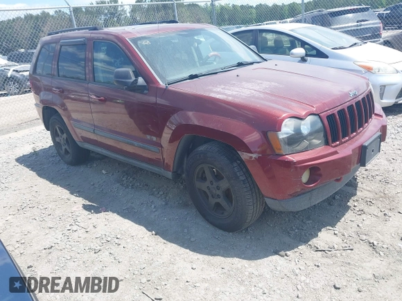 2007 Jeep Grand Cherokee Laredo with VIN 1J8GR48K57C618529, listed as a IAAI auction lot 42139566 with 174,559 mi miles. Bid and sale history available at carsss.com. Image 1.