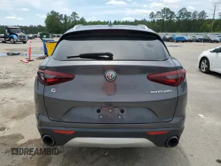2018 Alfa Romeo Stelvio z VIN ZASFAKANXJ7C19707, wystawiony jako Copart lot #56553175 z przebiegiem 67 757 mil mil oraz Tytuł czysty. Historia ofert i sprzedaży dostępna na DreamBid. Obrazek 6.
