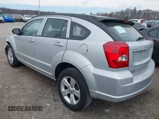 2011 Dodge Caliber Mainstreet with VIN 1B3CB3HA2BD238032, listed as a IAAI auction lot 41865918 with 98,022 mi miles and . Bid and sale history available at DreamBid. Image 3.