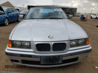 1998 BMW 3 Series 323i with VIN WBABJ8332WEM22760, listed as a Copart auction lot 59631805 with 77,300 mi miles and Salvage title. Bid and sale history available at DreamBid. Image 5.