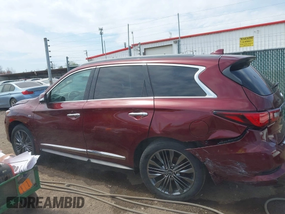 2019 Infiniti QX60 Luxe with VIN 5N1DL0MM5KC515014, listed as a IAAI auction lot 42073879 with 100,566 mi miles and . Bid and sale history available at DreamBid. Image 14.