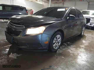 2014 Chevrolet Cruze LS with VIN 1G1PB5SH5E7460979, listed as a IAAI auction lot 41312075 with 123,580 mi miles. Bid and sale history available at carsss.com. Image 17.