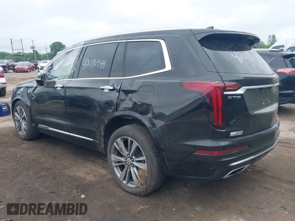 2020 Cadillac XT6 FWD Premium Luxury z VIN 1GYKPCRS6LZ148058, wystawiony jako IAAI lot #42416949 z przebiegiem 79 318 mil mil oraz . Historia ofert i sprzedaży dostępna na DreamBid. Obrazek 3.