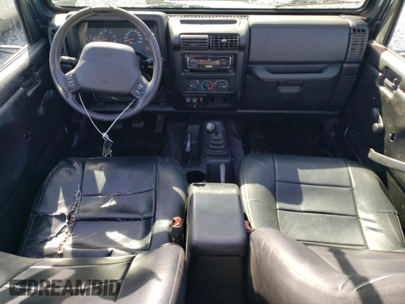 2002 Jeep Wrangler Sport with VIN 1J4FA49S92P715480, listed as a Copart auction lot 55157545 with 153,560 mi miles and Clean Title. Bid and sale history available at carsss.com. Image 9.