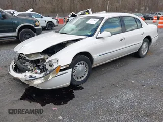 1998 Lincoln Continental with VIN 1LNFM97VXWY619313, listed as a IAAI auction lot 41477852 with 158,973 mi miles. Bid and sale history available at carsss.com. Image 18.