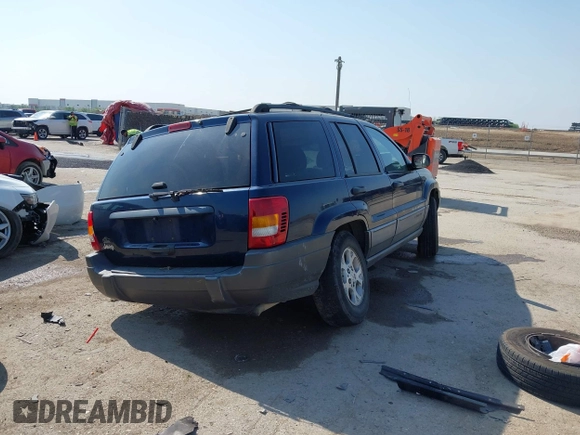 2000 Jeep Grand Cherokee Laredo with VIN 1J4G248S5YC413977, listed as a IAAI auction lot 42045808 with Not provided miles and . Bid and sale history available at DreamBid. Image 4.