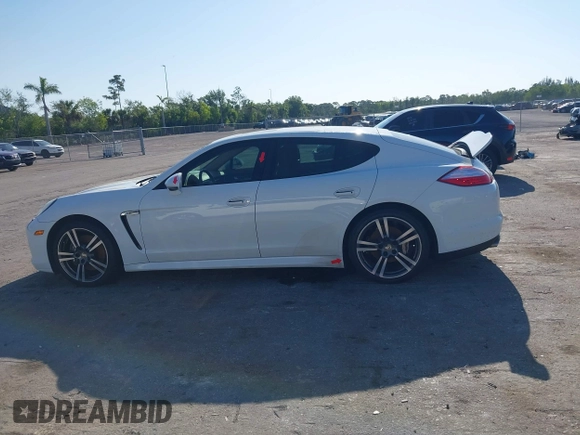 2013 Porsche Panamera with VIN WP0AA2A7XDL014047, listed as a IAAI auction lot 42010031 with 118,681 mi miles and . Bid and sale history available at DreamBid. Image 14.