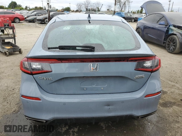 2022 Honda Civic Sport Touring z VIN 19XFL1H86NE011889, wystawiony jako Copart lot #53403415 z przebiegiem 93 619 mil mil oraz Szkoda całkowita • Salvage title. Historia ofert i sprzedaży dostępna na DreamBid. Obrazek 6.