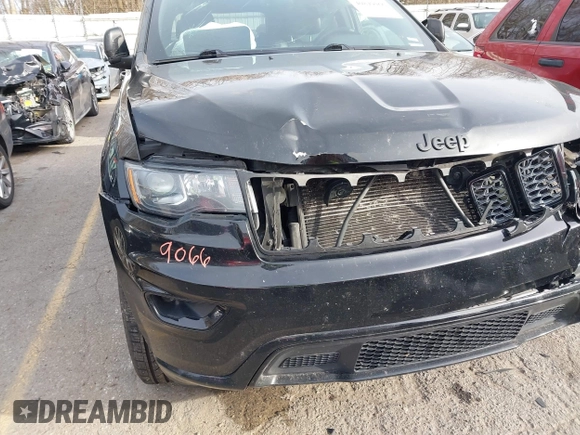 2017 Jeep Grand Cherokee Laredo with VIN 1C4RJFAG7HC873211, listed as a IAAI auction lot 40849066 with 139,430 mi miles. Bid and sale history available at carsss.com. Image 6.