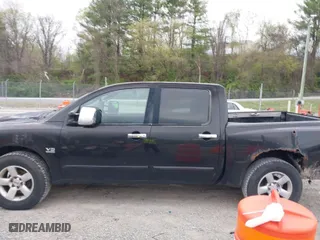 2004 Nissan Titan LE with VIN 1N6AA07BX4N533701, listed as a IAAI auction lot 41984635 with 119,191 mi miles. Bid and sale history available at carsss.com. Image 14.