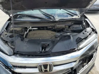 2021 Honda Pilot EX-L z VIN 5FNYF5H58MB008921, wystawiony jako Copart lot #56985395 z przebiegiem Nie podano mil oraz Szkoda całkowita • Salvage title. Historia ofert i sprzedaży dostępna na DreamBid. Obrazek 12.