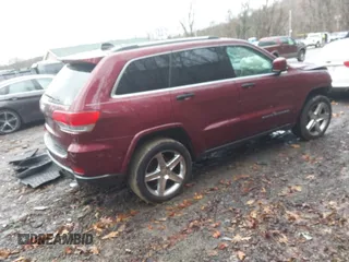 2018 Jeep Grand Cherokee Limited with VIN 1C4RJFBG9JC229424, listed as a IAAI auction lot 41208091 with 71,499 mi miles and . Bid and sale history available at DreamBid. Image 4.