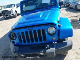 2014 Jeep Wrangler Unlimited Sahara with VIN 1C4HJWEG1EL188445, listed as a IAAI auction lot 41654579 with 79,948 mi miles. Bid and sale history available at carsss.com. Image 12.