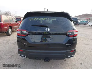 2024 Honda Pilot Touring with VIN 5FNYG1H72RB007519, listed as a IAAI auction lot 40973780 with 24,908 mi miles. Bid and sale history available at carsss.com. Image 16.