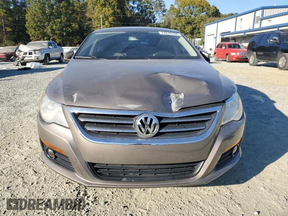 2010 Volkswagen CC Sport with VIN WVWMN7AN3AE541988, listed as a Copart auction lot 77670794 with 100,277 mi miles and Salvage Title. Bid and sale history available at DreamBid. Image 5.