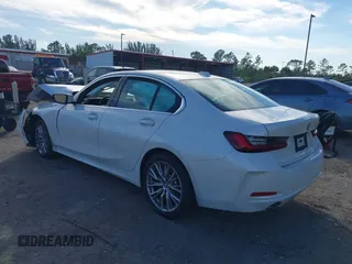 2024 BMW 3 Series 330i with VIN 3MW69FF07R8E63764, listed as a IAAI auction lot 41428605 with 5,355 mi miles. Bid and sale history available at carsss.com. Image 3.