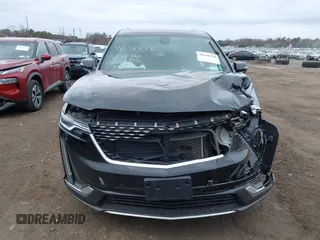 2021 Cadillac XT6 Premium Luxury with VIN 1GYKPCRSXMZ222454, listed as a IAAI auction lot 41648439 with 113,547 mi miles and . Bid and sale history available at carsss.com. Image 12.