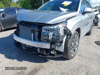 2023 Hyundai Santa Fe Calligraphy with VIN 5NMS54AL2PH560512, listed as a IAAI auction lot 39492126 with 6,379 mi miles and . Bid and sale history available at DreamBid. Image 6.