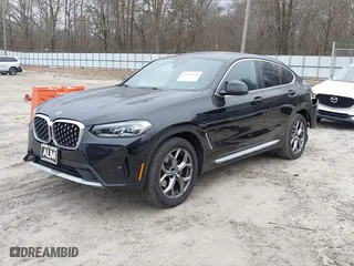 2023 BMW X4 xDrive30i with VIN 5UX33DT01P9S20808, listed as a IAAI auction lot 41153530 with NaN miles. Bid and sale history available at carsss.com. Image 18.