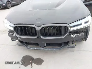 2014 BMW 5 Series 535d with VIN WBAXA5C59ED690375, listed as a IAAI auction lot 42030902 with 70,553 mi miles and . Bid and sale history available at carsss.com. Image 6.