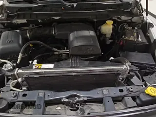 2017 Ram 1500 Tradesman z VIN 1C6RR6FG8HS855010, wystawiony jako Copart lot #67552945 z przebiegiem 199 734 mil mil oraz Czysty tytuł • Clean title. Historia ofert i sprzedaży dostępna na DreamBid. Obrazek 14.