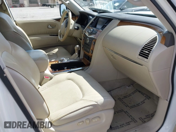 2012 Infiniti QX56 7-passenger z VIN JN8AZ2NE5C9022039, wystawiony jako IAAI lot #41993402 z przebiegiem 126 667 mil mil oraz . Historia ofert i sprzedaży dostępna na DreamBid. Obrazek 5.