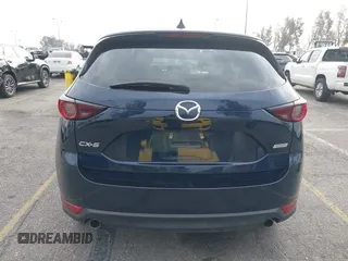 2019 Mazda CX-5 Touring with VIN JM3KFACM5K0697137, listed as a IAAI auction lot 41720253 with 50,416 mi miles. Bid and sale history available at carsss.com. Image 16.