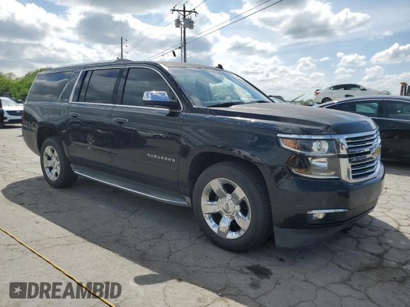 2015 Chevrolet Suburban LTZ with VIN 1GNSCKKC9FR151532, listed as a Copart auction lot 54209315 with 122,380 mi miles and Salvage title. Bid and sale history available at DreamBid. Image 4.