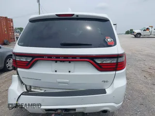 2014 Dodge Durango R/T with VIN 1C4SDHCT5EC590056, listed as a IAAI auction lot 42469695 with 174,356 mi miles and . Bid and sale history available at DreamBid. Image 16.