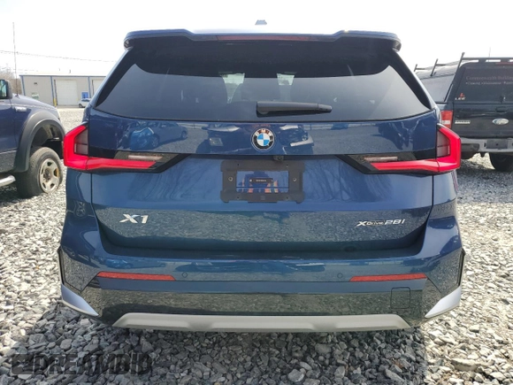 2023 BMW X1 xDrive28i with VIN WBX73EF05P5Y21721, listed as a Copart auction lot 50749295 with 10,633 mi miles and Salvage title. Bid and sale history available at DreamBid. Image 6.