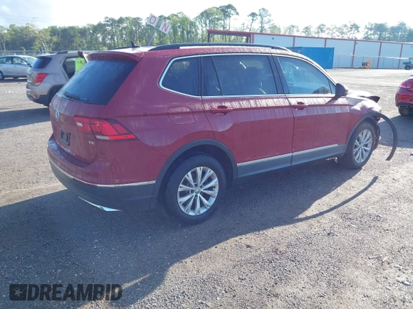 2018 Volkswagen Tiguan SEL z VIN 3VV3B7AX3JM054842, wystawiony jako IAAI lot #42240503 z przebiegiem 47 300 mil mil oraz . Historia ofert i sprzedaży dostępna na DreamBid. Obrazek 4.
