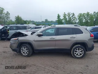2017 Jeep Cherokee Latitude with VIN 1C4PJMCB3HW657318, listed as a IAAI auction lot 42429044 with 133,335 mi miles and . Bid and sale history available at DreamBid. Image 14.