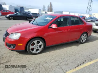 2009 Volkswagen Jetta с VIN 3VWBA71K29M008297, выставлен на аукционе Copart как лот 45571505 с пробегом 118 454 миль миль и Чистый • Clean title. История ставок и продаж доступна на DreamBid. Изображение 1.