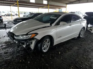 2016 Ford Fusion Titanium Hybrid with VIN 3FA6P0RUXGR314220, listed as a Copart auction lot 61512404 with 152,067 mi miles and Salvage Title. Bid and sale history available at carsss.com. Image 1.